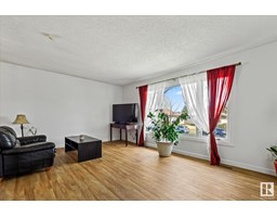 Family room - 10234 74 St Nw, Edmonton, AB T6A2Y1 Photo 4