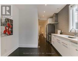 Living room - Main 308 St Clarens Avenue, Toronto, ON M6H3W3 Photo 3