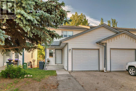 Living room - 107 Strathaven Heights, Strathmore, AB T1P1P3 Photo 1