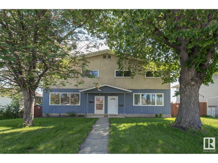 Living room - 12723 12725 94 St Nw, Edmonton, AB T5E3V4 Photo 1