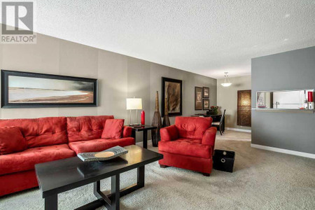 Living room - 220 525 56 Avenue Sw, Calgary, AB T2V4Z9 Photo 1