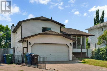 52 Woodstock Way Sw, Calgary