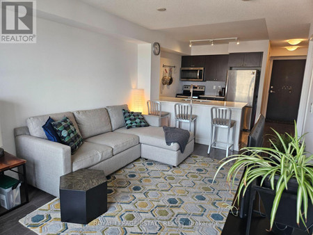Living room - 603 8 Trent Avenue, Toronto, ON M4C0A6 Photo 1